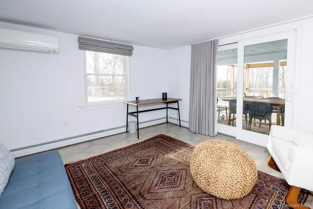 a bed room with a bed and a window