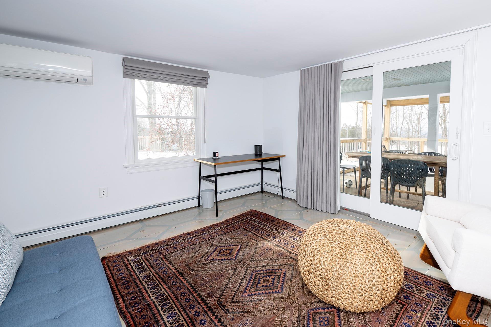 692 Bangall Road Millbrook, NY 12545 - Photo 16 of 30 wooden floor with windows