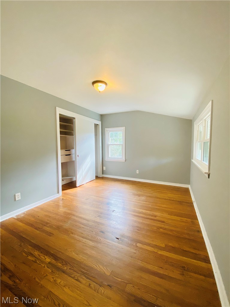 3683 Highland Road Cleveland, OH 44111 - Photo 10 of 17 Hardwood floored spare room featuring lofted ceiling