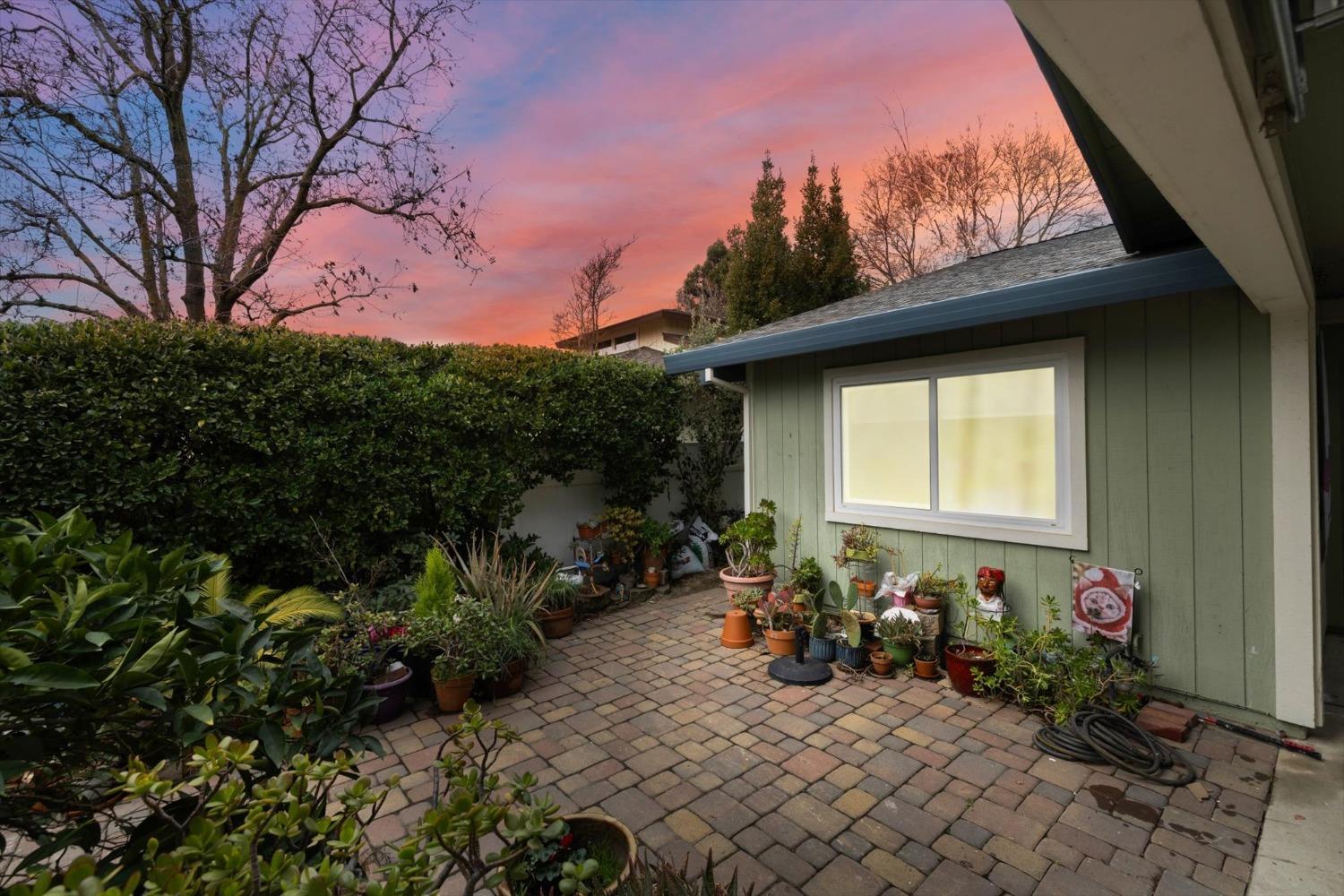 3413 Seabright Avenue Davis, CA 95616 - Photo 1 of 1 a backyard of a house with table and chairs