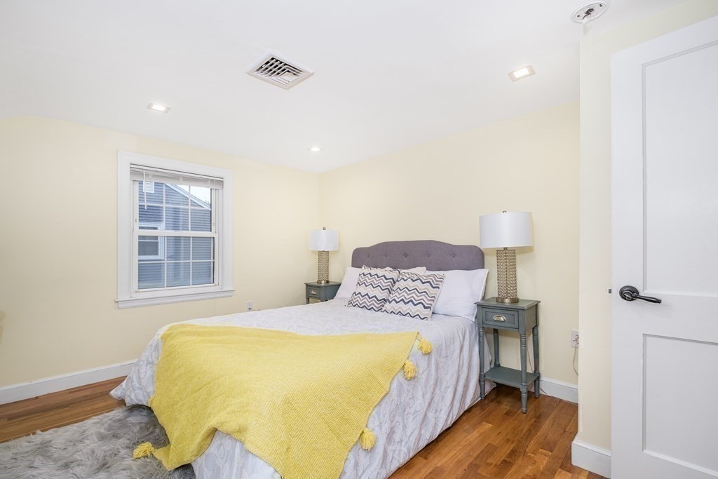 32 Tufts Road Winchester, MA 01890 - Photo 12 of 24 a bed room with a bed and a window