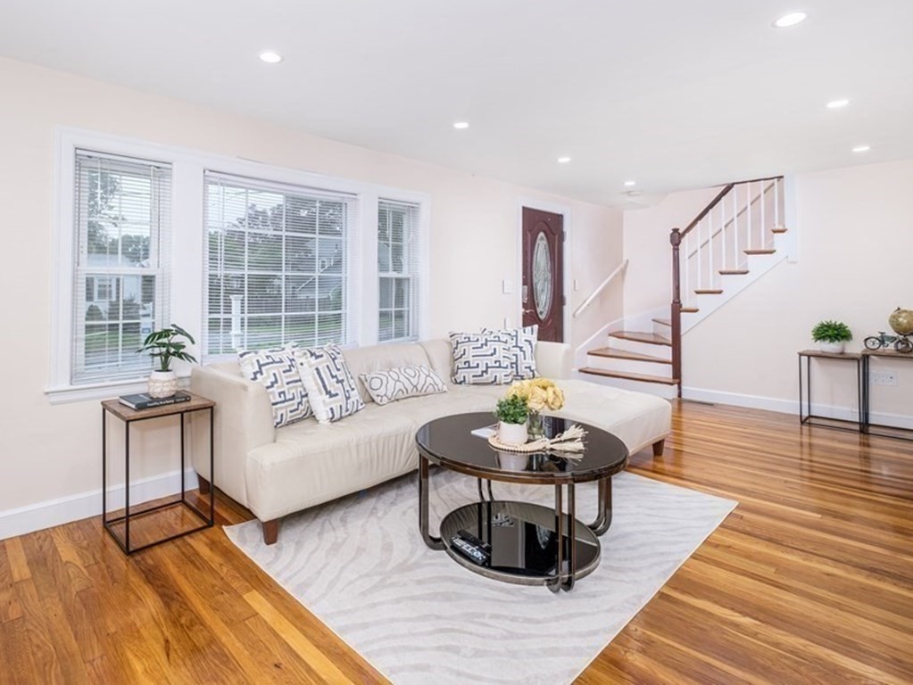 32 Tufts Road Winchester, MA 01890 - Photo 2 of 24 a living room with furniture and a wooden floor