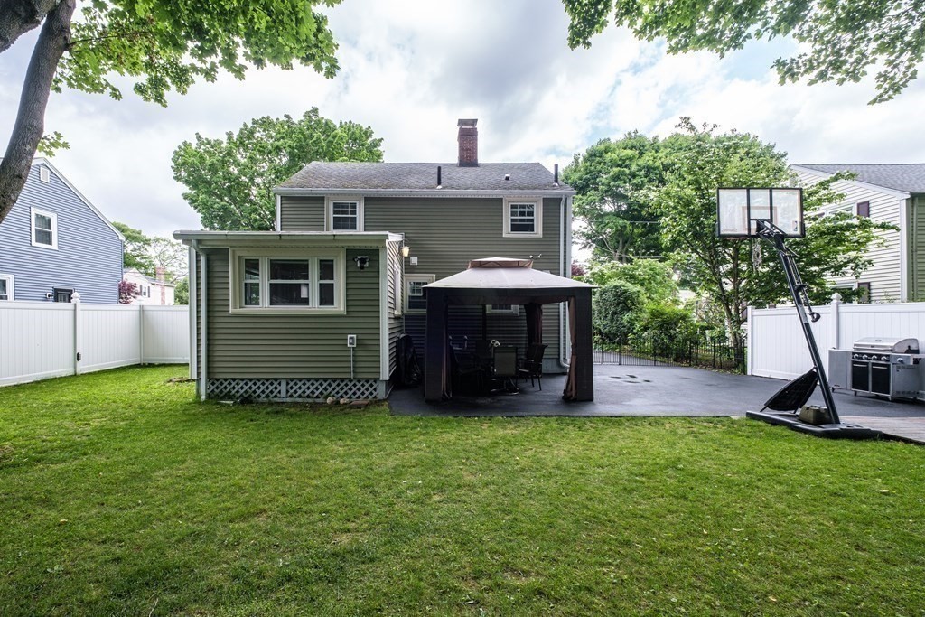 32 Tufts Road Winchester, MA 01890 - Photo 21 of 24 a front view of a house with a garden