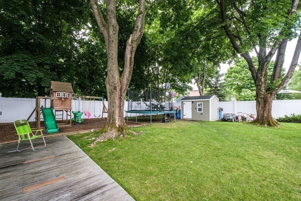 32 Tufts Road Winchester, MA 01890 - Photo 22 of 24 a view of a house with backyard and a tree