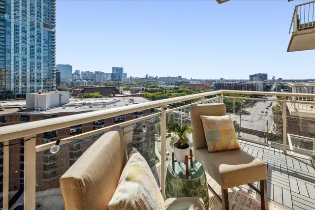 a view of roof deck with seating space and barbeque oven