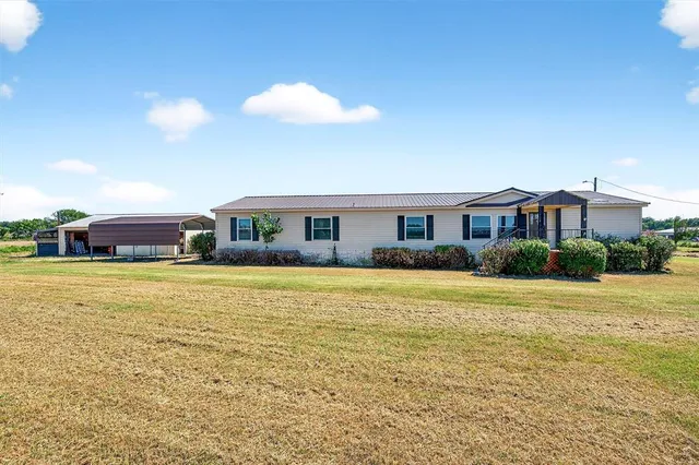 a house view with a swimming pool