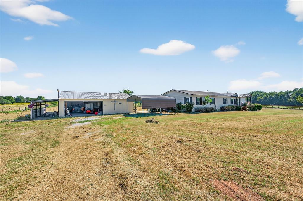 12085 Keys Road Marietta, OK 73448 - Photo 22 of 40 a house view with a swimming pool