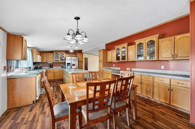 a living room with furniture fireplace and a flat screen tv