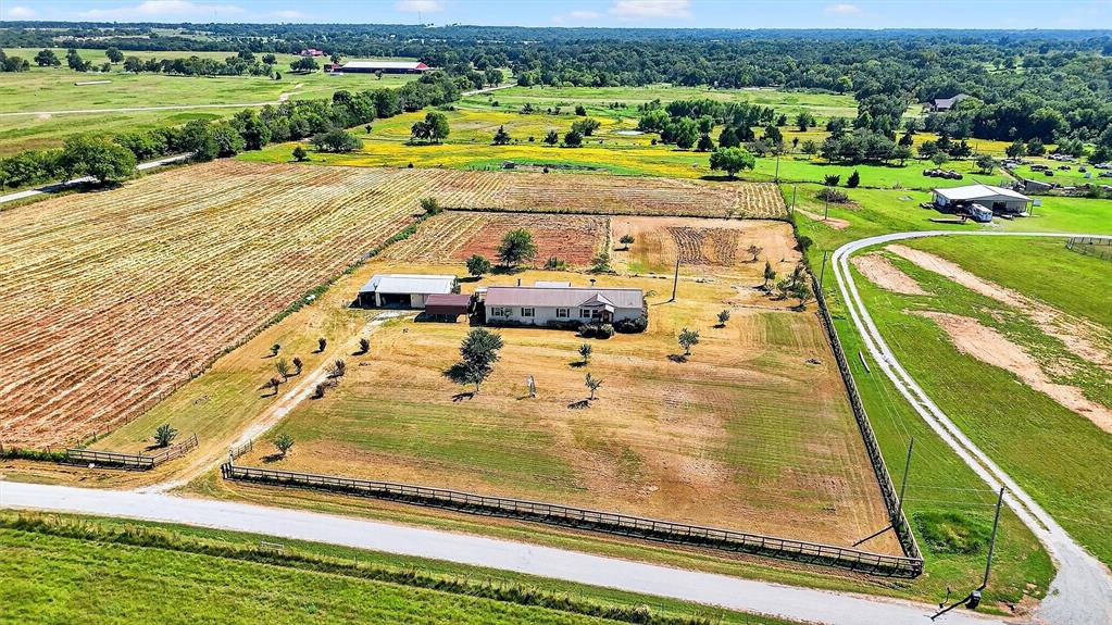 12085 Keys Road Marietta, OK 73448 - Photo 3 of 40 swimming pool view with a garden and ocean view