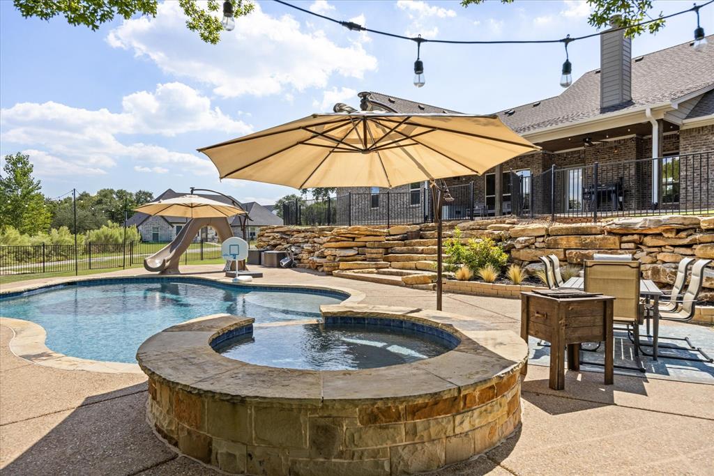 3868 Legend Trail Granbury, TX 76049 - Photo 35 of 39 Backyard is very private feeling as it backs to heavily treed area and side yard faces the dead end street.