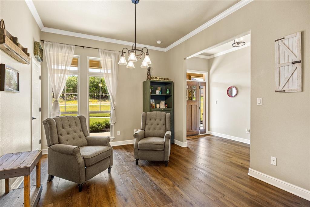 3868 Legend Trail Granbury, TX 76049 - Photo 7 of 39 Spacious formal dining area currently used as additional sitting area. Open to everything and perfect for entertaining.