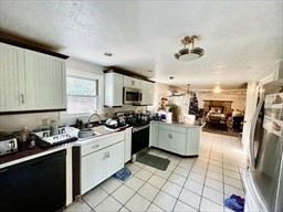 48 Grove Plympton Ma Plympton, MA 02367 - Photo 5 of 10 a kitchen with a sink appliances and cabinets