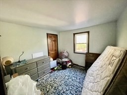 48 Grove Plympton Ma Plympton, MA 02367 - Photo 8 of 10 a bedroom with furniture and a window