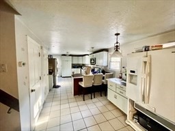 48 Grove Plympton Ma Plympton, MA 02367 - Photo 9 of 10 a living room with furniture and a bath tub