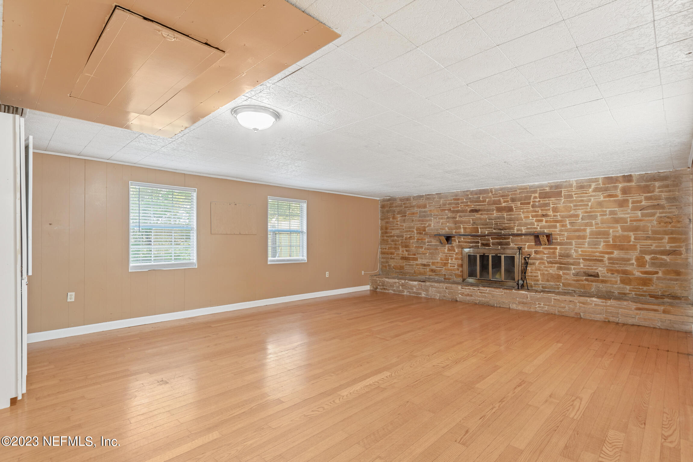 665 Lee Road Jacksonville, FL 32225 - Photo 17 of 58 an empty room with windows