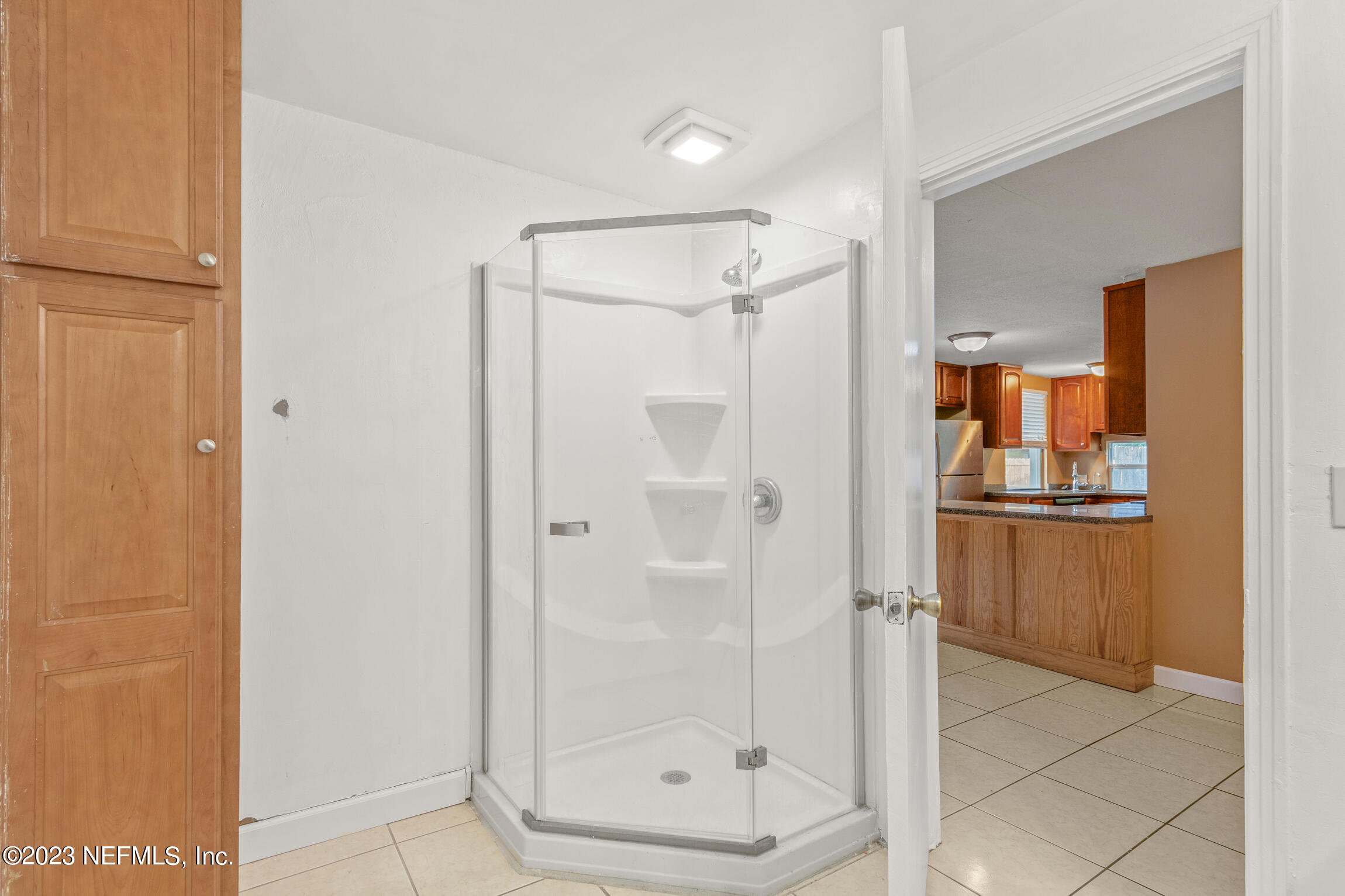 665 Lee Road Jacksonville, FL 32225 - Photo 20 of 58 a bathroom with a shower and a sink