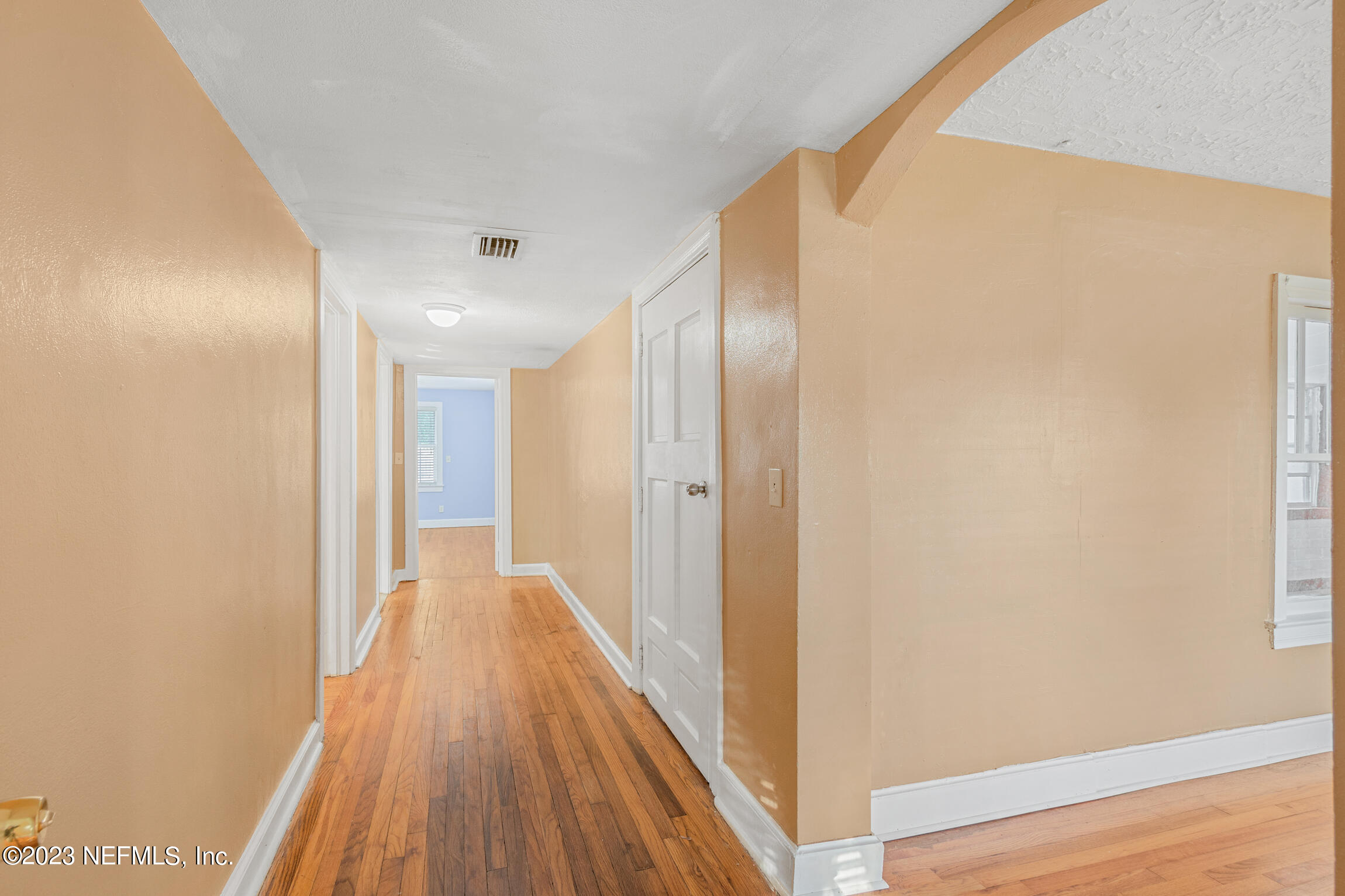 665 Lee Road Jacksonville, FL 32225 - Photo 22 of 58 a view of a hallway with wooden floor