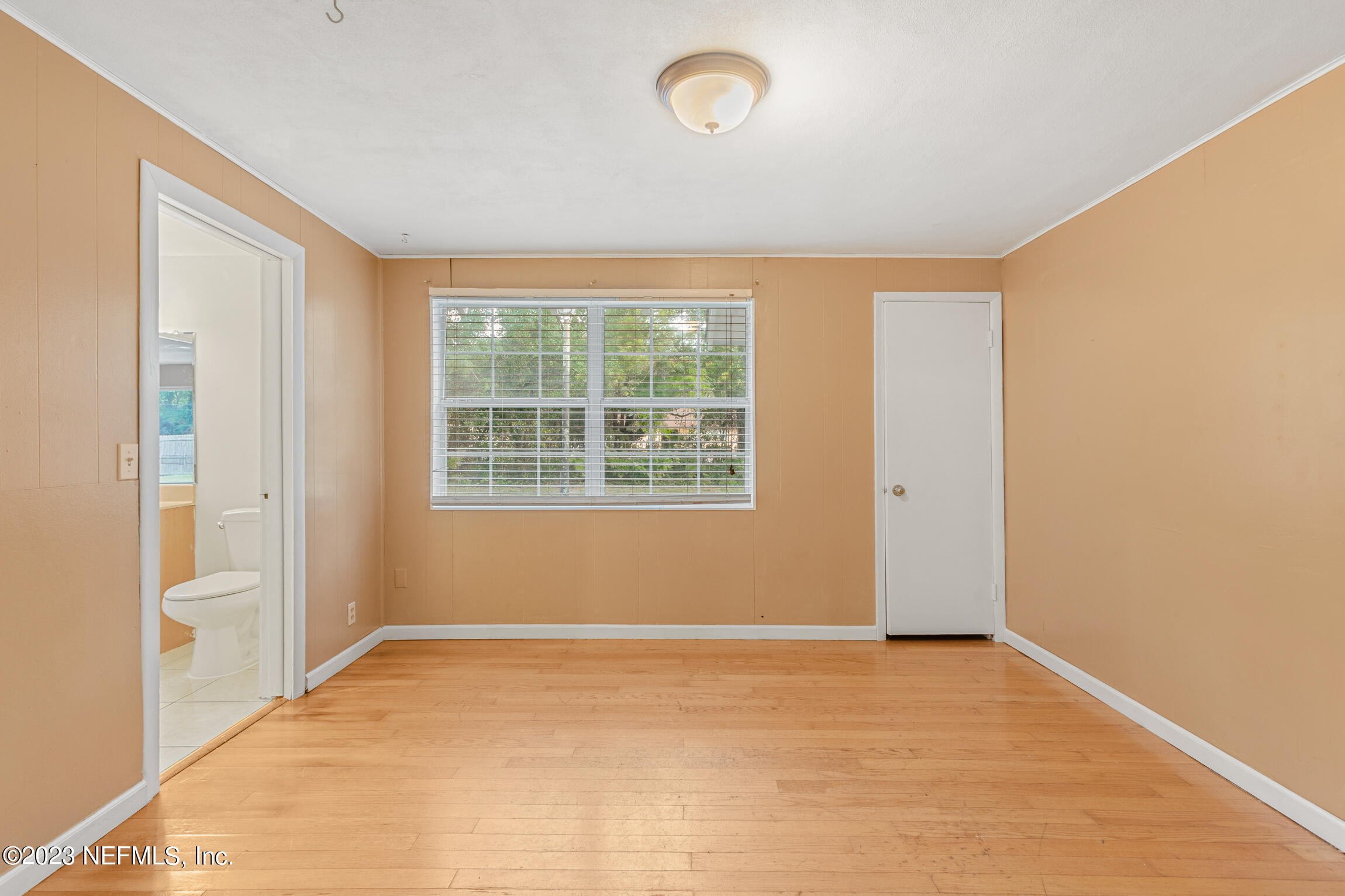 665 Lee Road Jacksonville, FL 32225 - Photo 27 of 58 a view of an empty room with a window