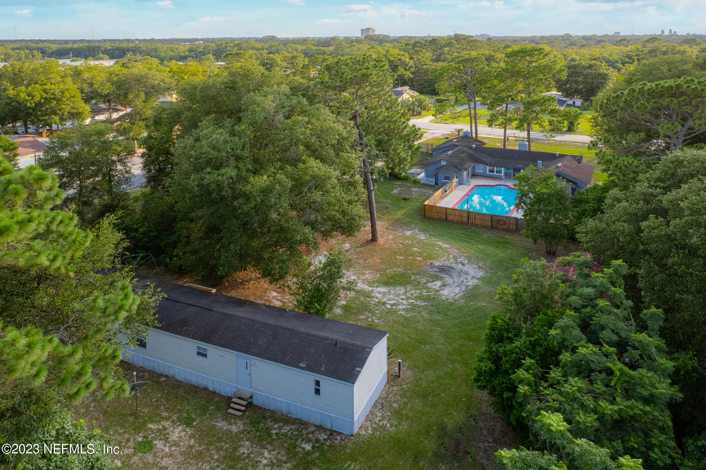 665 Lee Road Jacksonville, FL 32225 - Photo 4 of 58 a view of a yard with a lake view