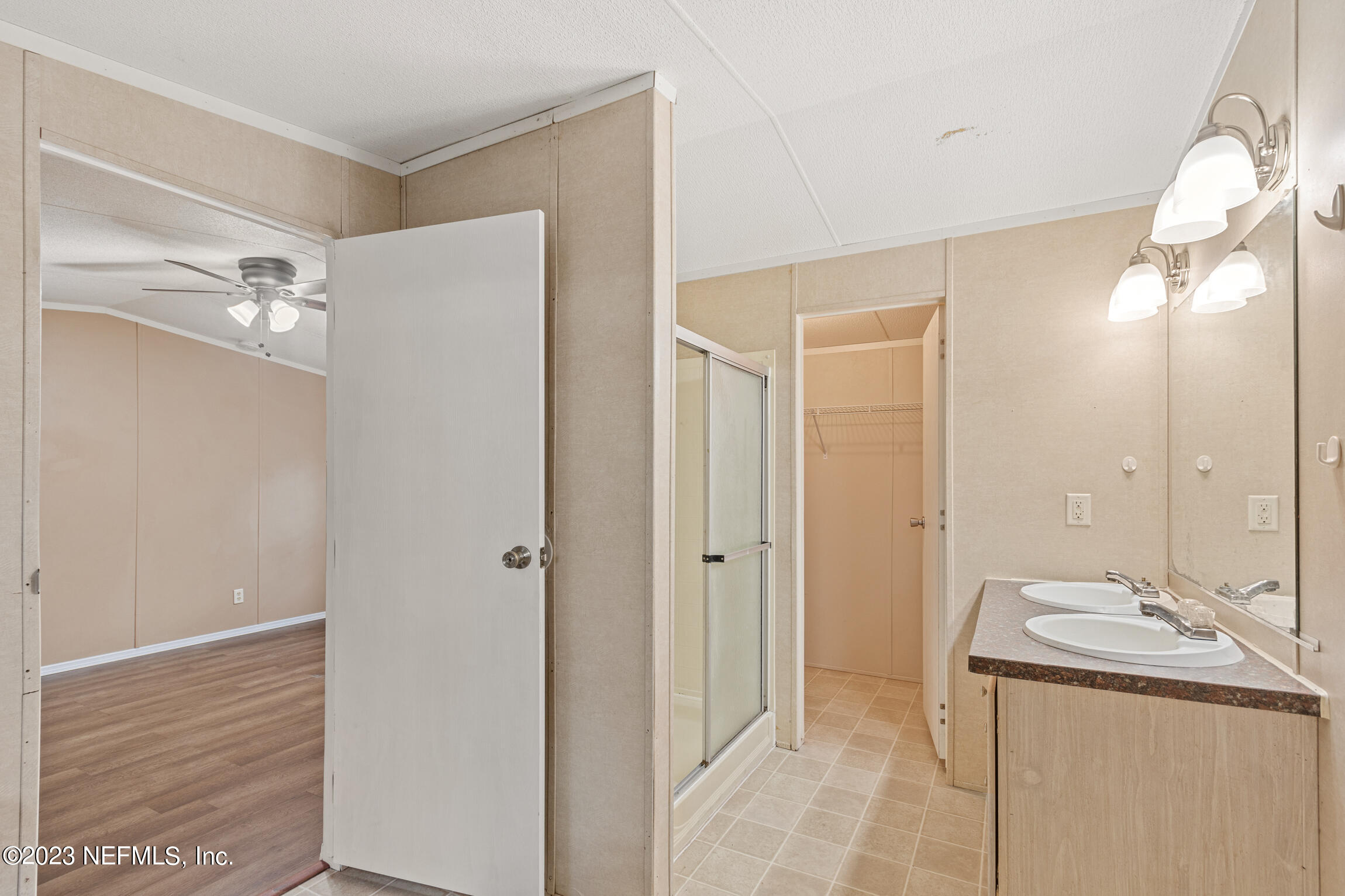 665 Lee Road Jacksonville, FL 32225 - Photo 44 of 58 a bathroom with a sink a toilet and shower