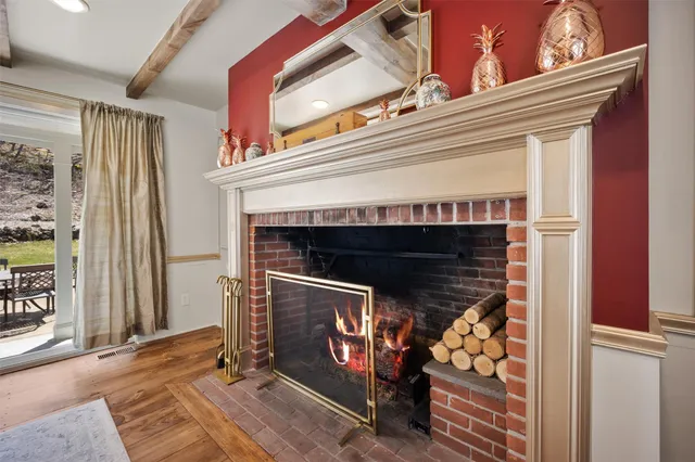 a bed room with a bed and a television