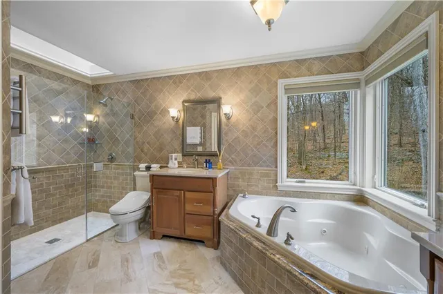 a view of a room with wooden floor and cabinet