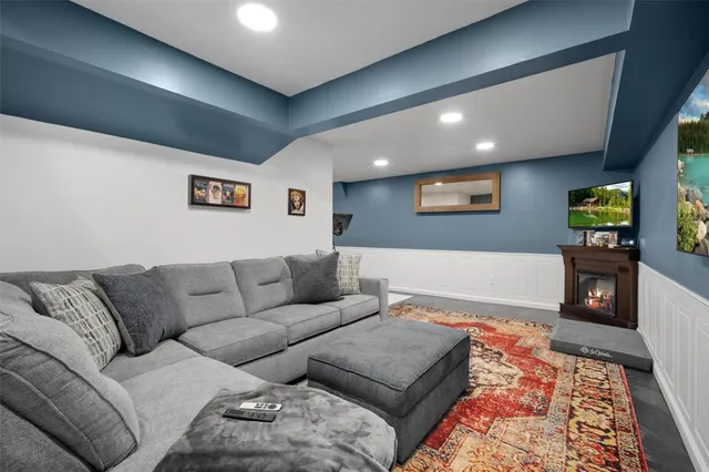 a view of a house with a yard and sitting area