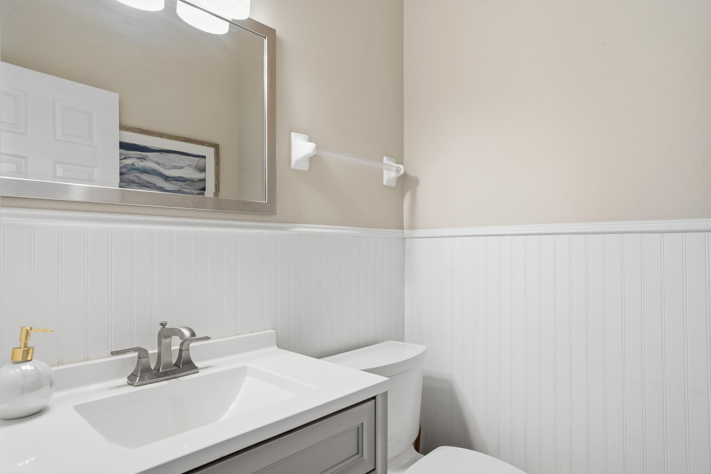 8570 May Orchard Lane Cordova, TN 38018 - Photo 13 of 35 Bathroom with vanity and wainscoting