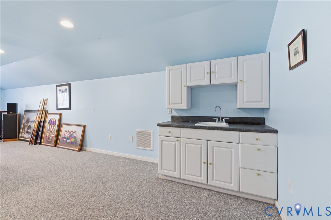 1306 Bach Terrace Midlothian, VA 23114 - Photo 38 of 51 3rd floor finished with a small sink while you are