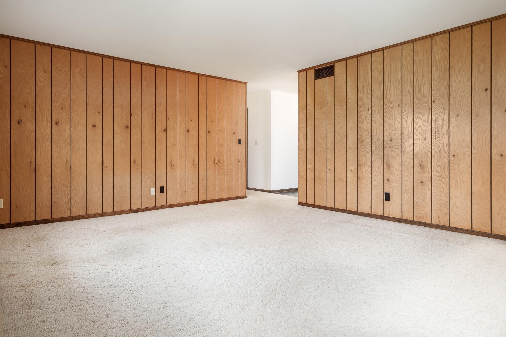 8169 Clockview Road Rockford, IL 61108 - Photo 17 of 34 an empty room with a wooden door