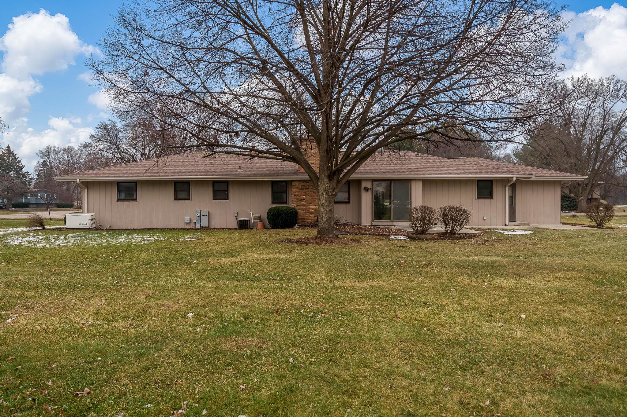8169 Clockview Road Rockford, IL 61108 - Photo 32 of 34 a front view of a house with swimming pool