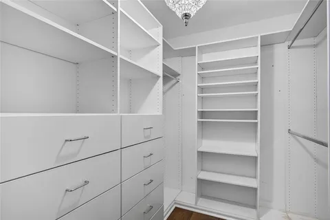 a view of an empty walk in closet