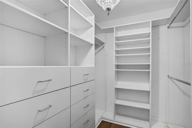 a view of an empty walk in closet