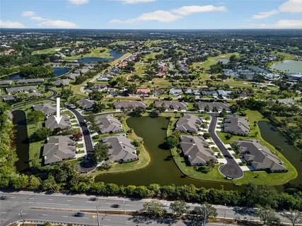 an aerial view of a city with lots of residential buildings