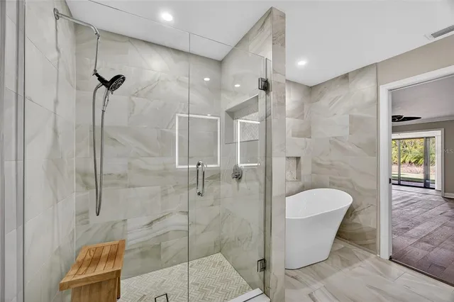 a bathroom with a shower and a toilet