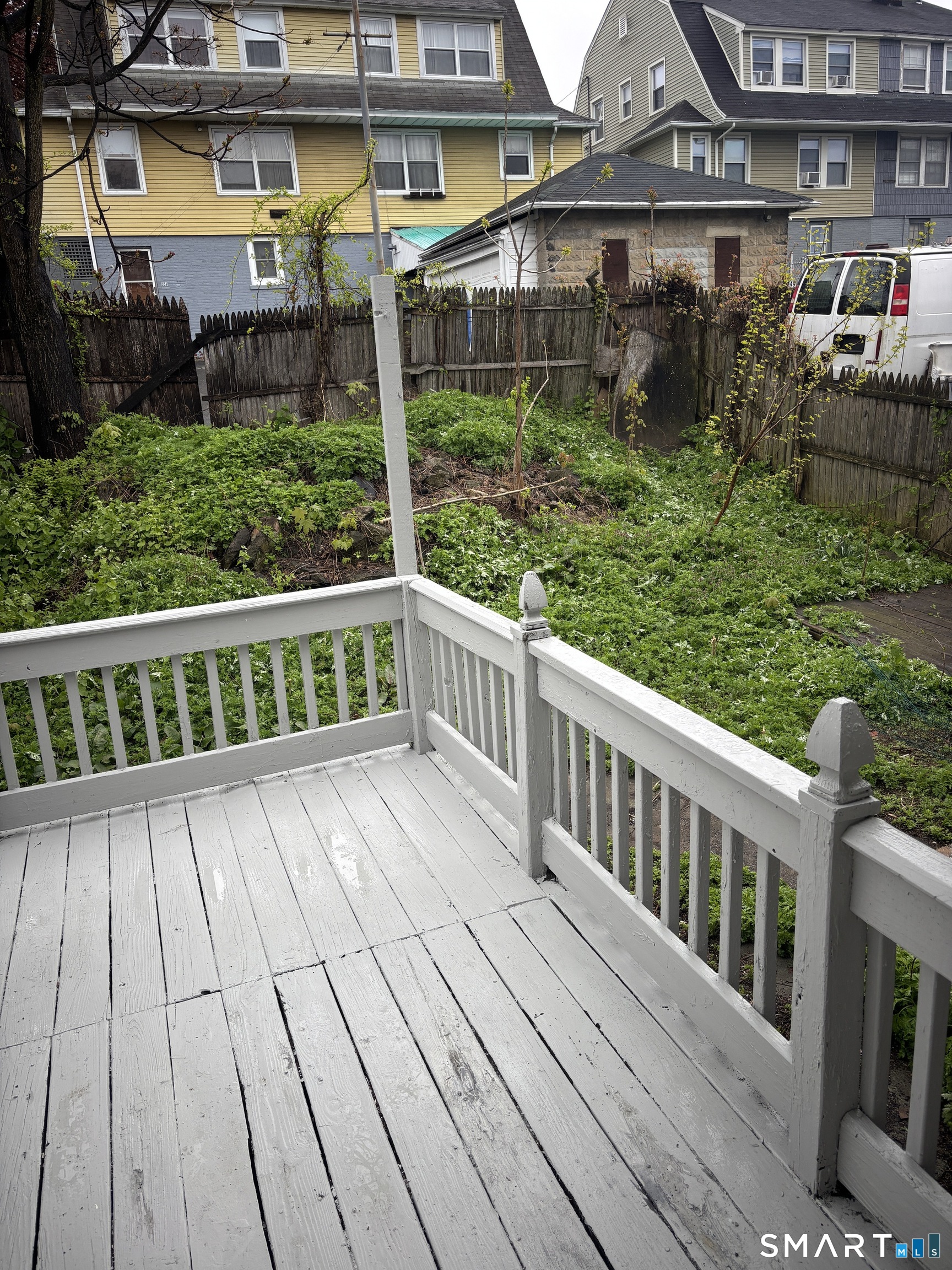 366 Dover Street Bridgeport, CT 06610 - Photo 14 of 15 a view of a house with wooden deck