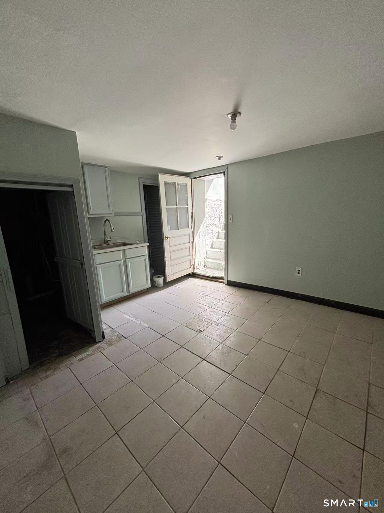 366 Dover Street Bridgeport, CT 06610 - Photo 9 of 15 a view of empty room with wooden floor
