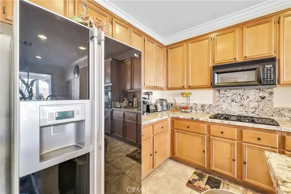 a view of storage and utility room with washer and dryer