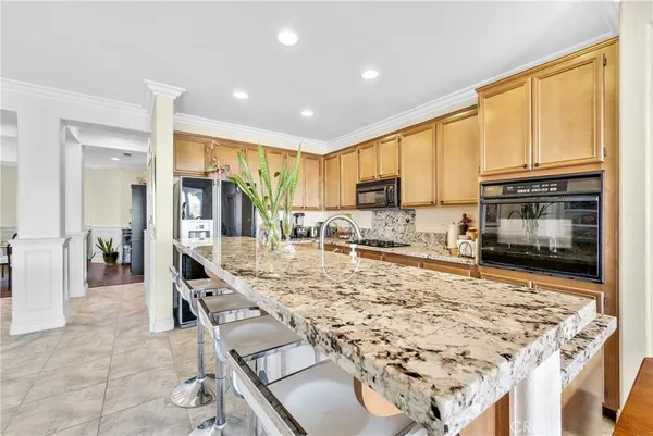 a living room with furniture rug and window