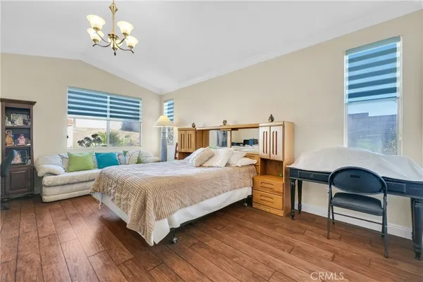 a view of a patio with table and chairs and potted plants
