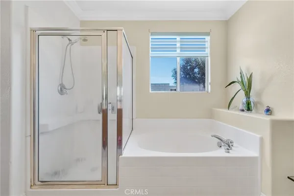 a view of a lake with a house in the background