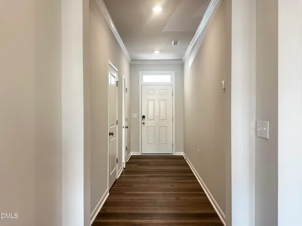 a view of a hallway with a entryway