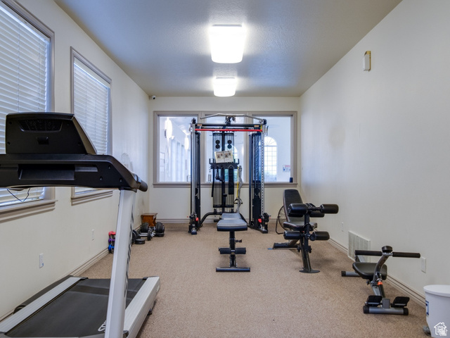 962 Independence Avenue Provo, UT 84604 - Photo 27 of 31 Workout area featuring carpet and baseboards