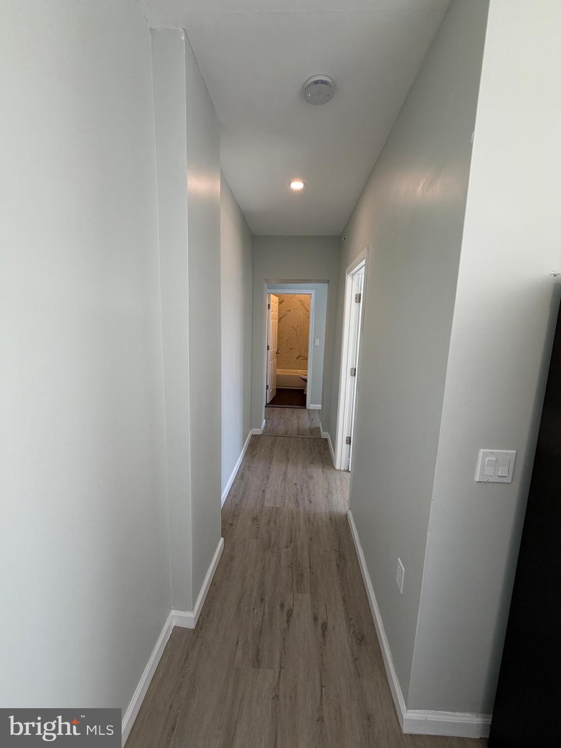 6035 Germantown Avenue, Unit 3R Philadelphia, PA 19144 - Photo 4 of 12 a view of hallway with wooden floor