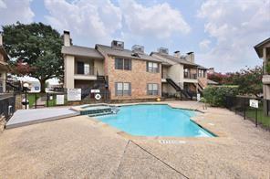 2835 Keller Springs Road, Unit 808 Carrollton, TX 75006 - Photo 8 of 16 Pool featuring a community hot tub, a patio, and fence