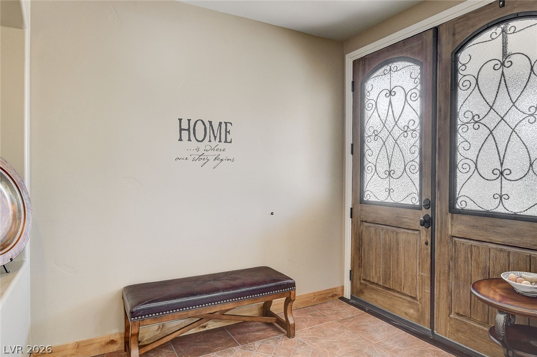 1950 Bowman Road Logandale, NV 89021 - Photo 5 of 81 Ornate glass-paneled double doors greet you upon entering this inviting home.