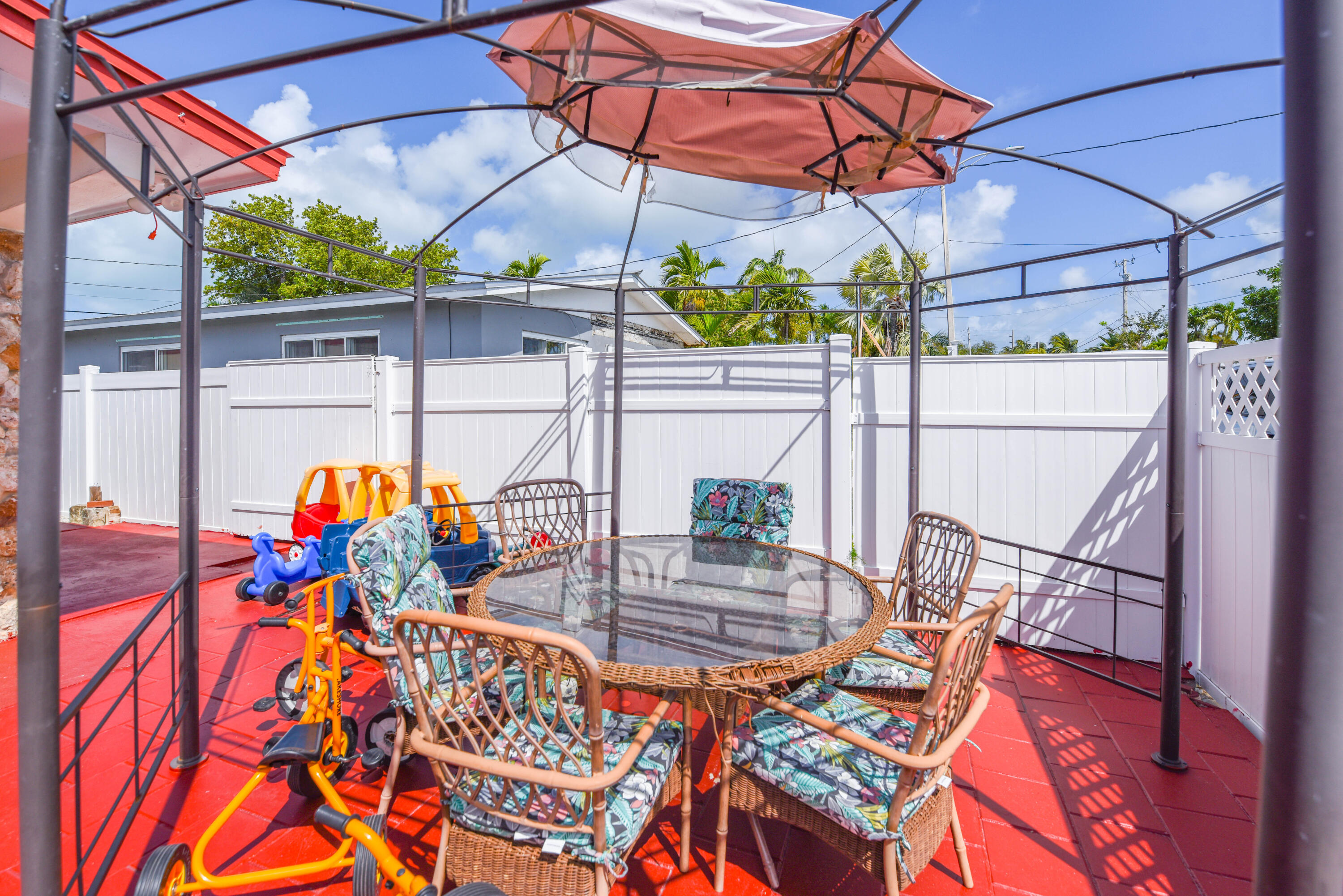 1524 5th Street Key West, FL 33040 - Photo 25 of 31 a outdoor view with sitting space and glass windows