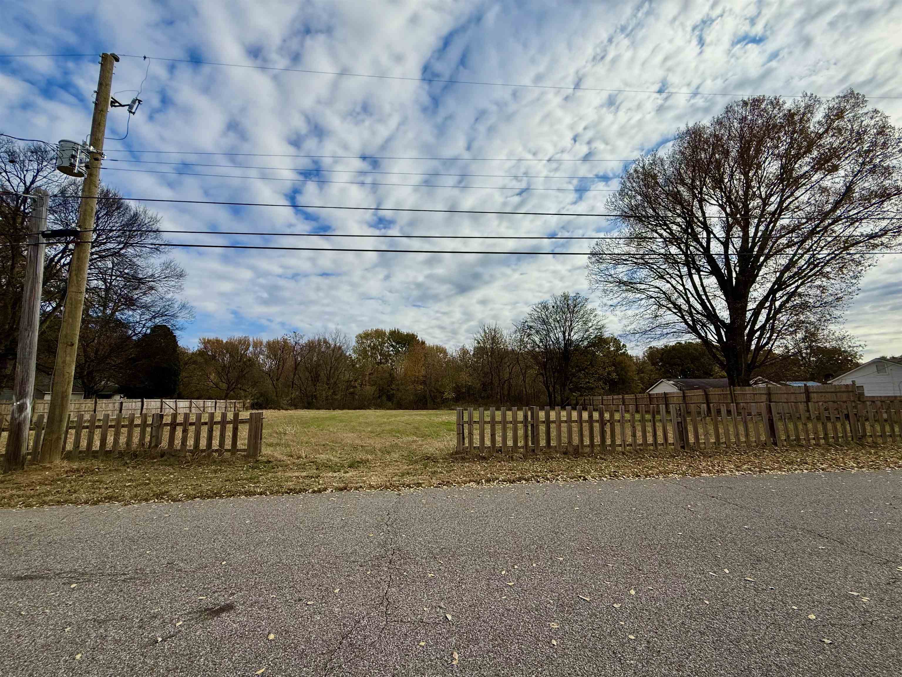 3520 Cook Road Memphis, TN 38109 - Photo 2 of 7 a view of street with wooden fence