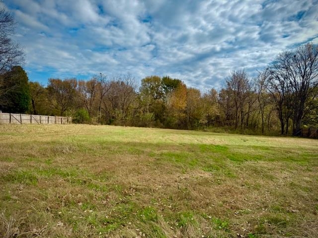 3520 Cook Road Memphis, TN 38109 - Photo 4 of 7 a view of a field with an trees