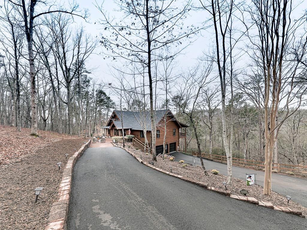 1670 Outback Road Jasper, GA 30143 - Photo 53 of 75 a view of a street with a building on the road